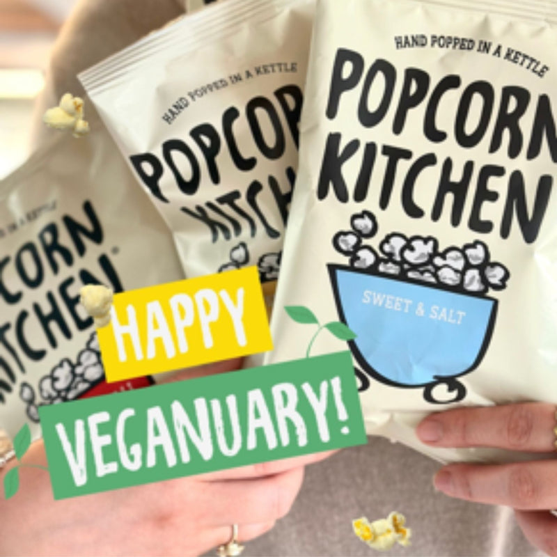 Happy Veganuary text and vegan popcorn packs