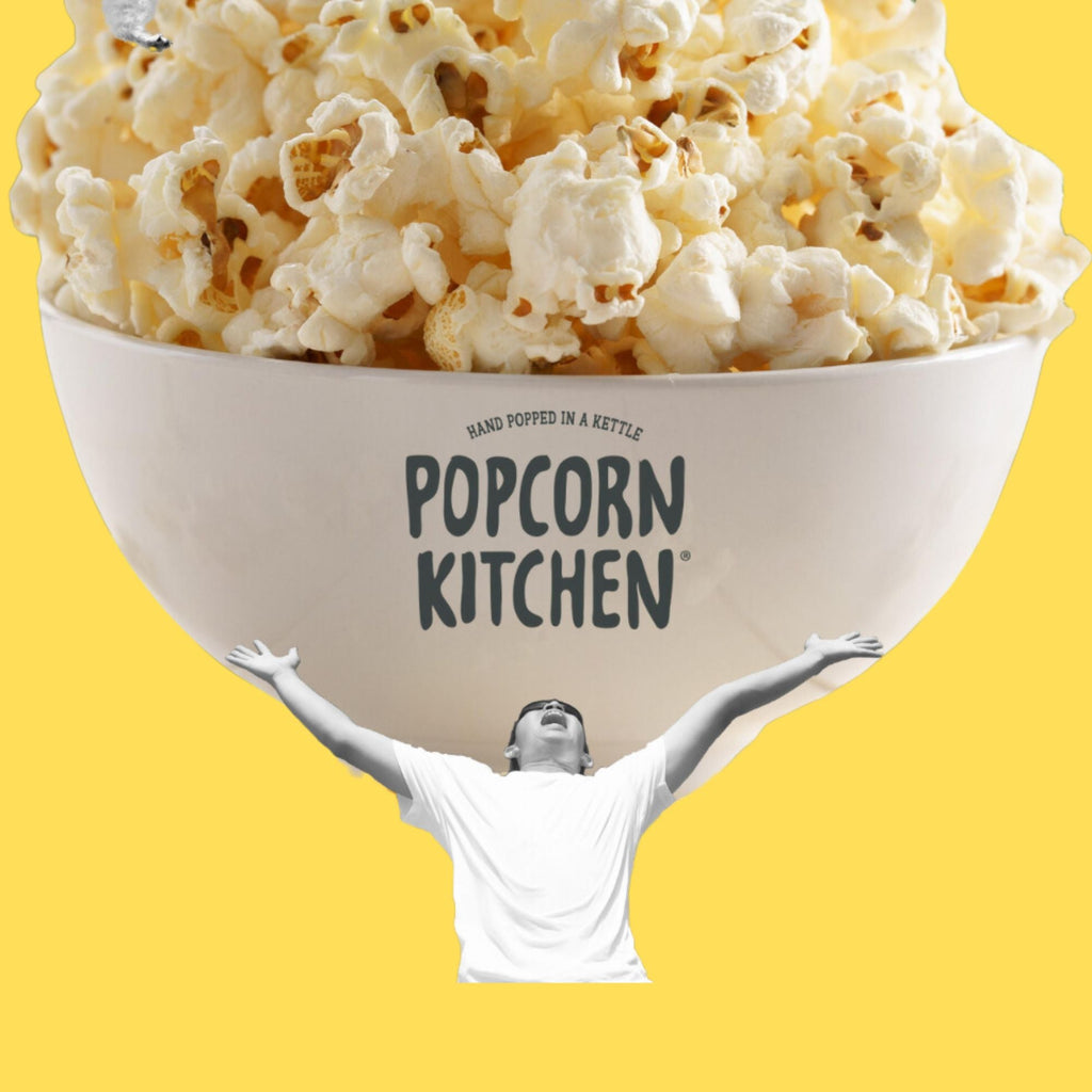 Huge bowl of popcorn with popcorn kitchen logo
