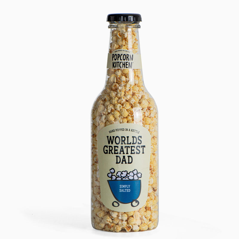 Giant bottle of popcorn with worlds greatest dad label on a white background