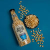 Giant bottle of popcorn with worlds greatest dad label and a bowl of popcorn