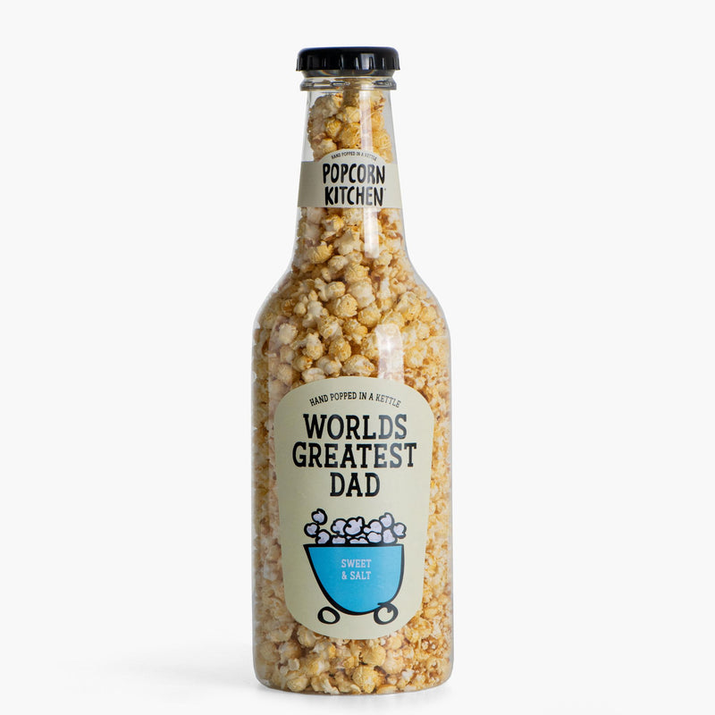 Giant bottle of popcorn with worlds greatest dad label on a white background