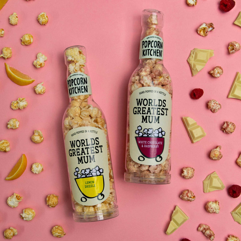 2 popcorn gift bottles with worlds best mum label and popcorn pieces